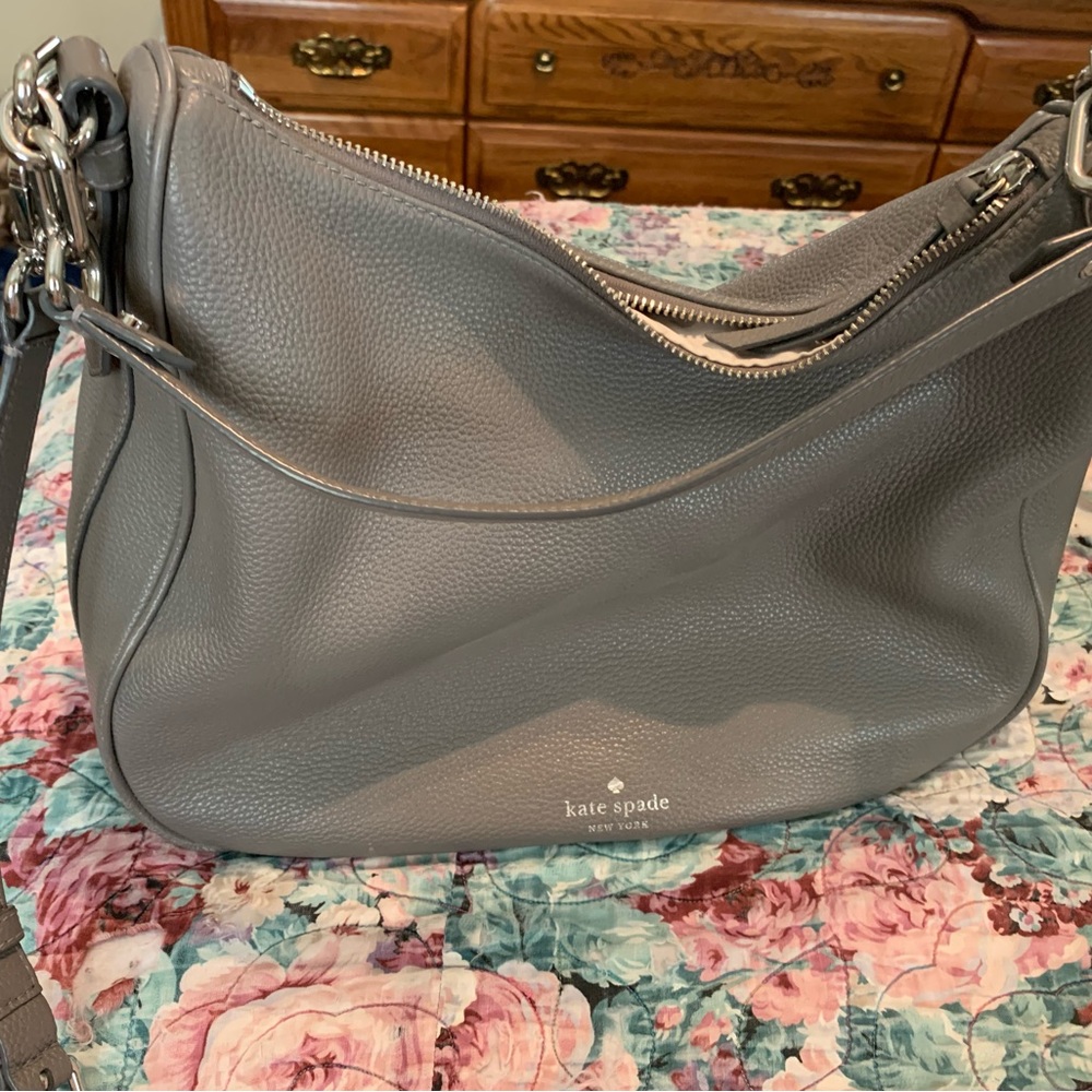 This is a kate spade purse and crossbody excellent condition just to big.